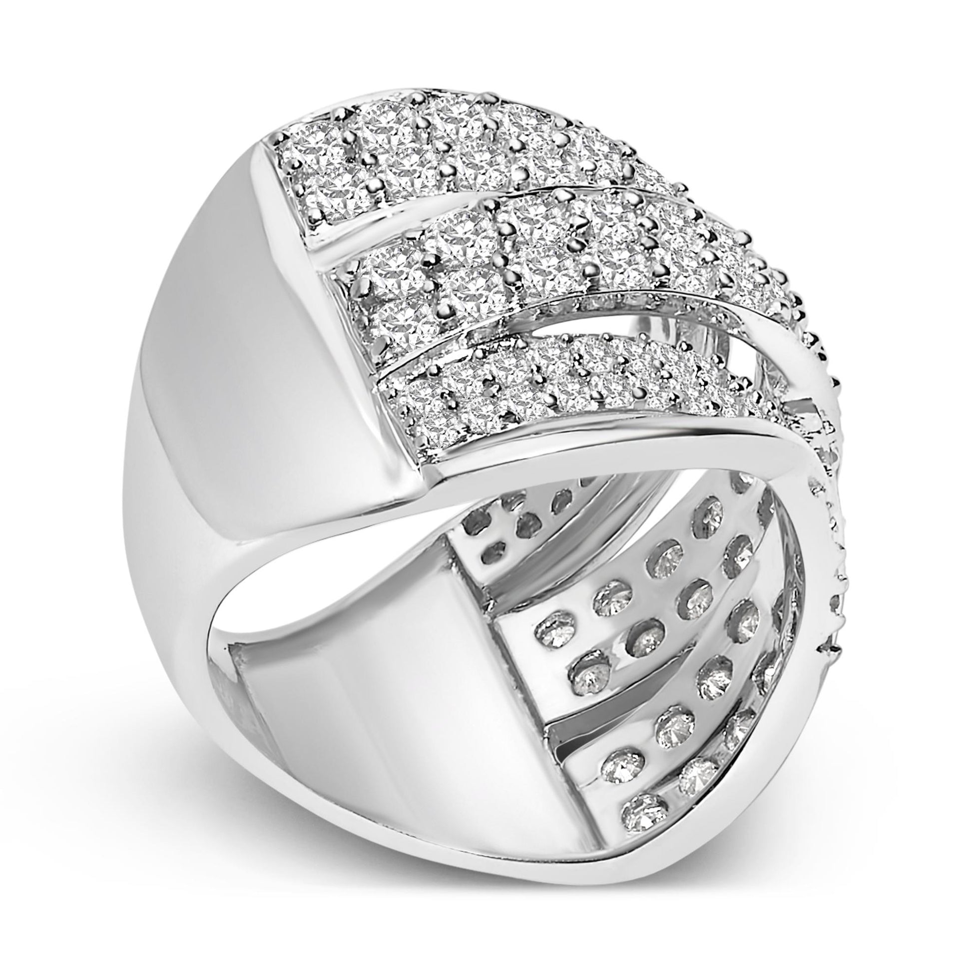 White metal ring with multiple rows of round white gemstones in prong settings, shown at a slight angle.
