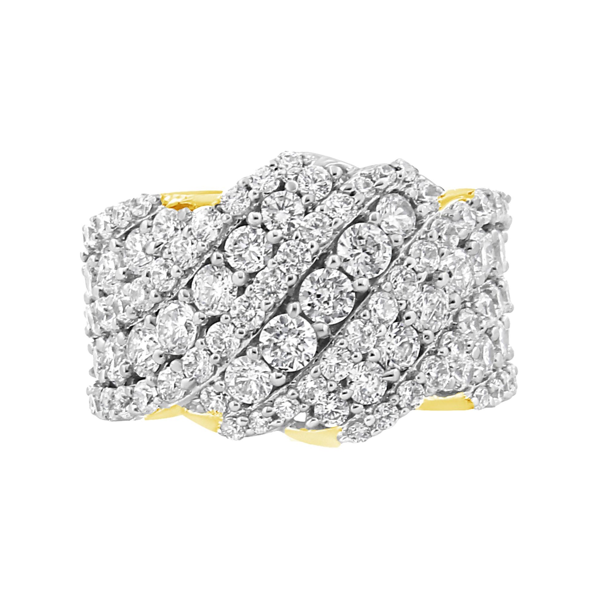 Close-up front view of a wide yellow ring intricately designed with numerous prong-set round white gemstones arranged in overlapping diagonal rows.