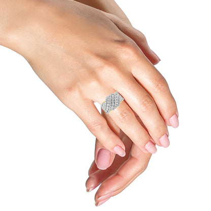 Yellow ring with multiple rows of round white gemstones in prong settings, worn on a model’s hand, shown from an angled top view.