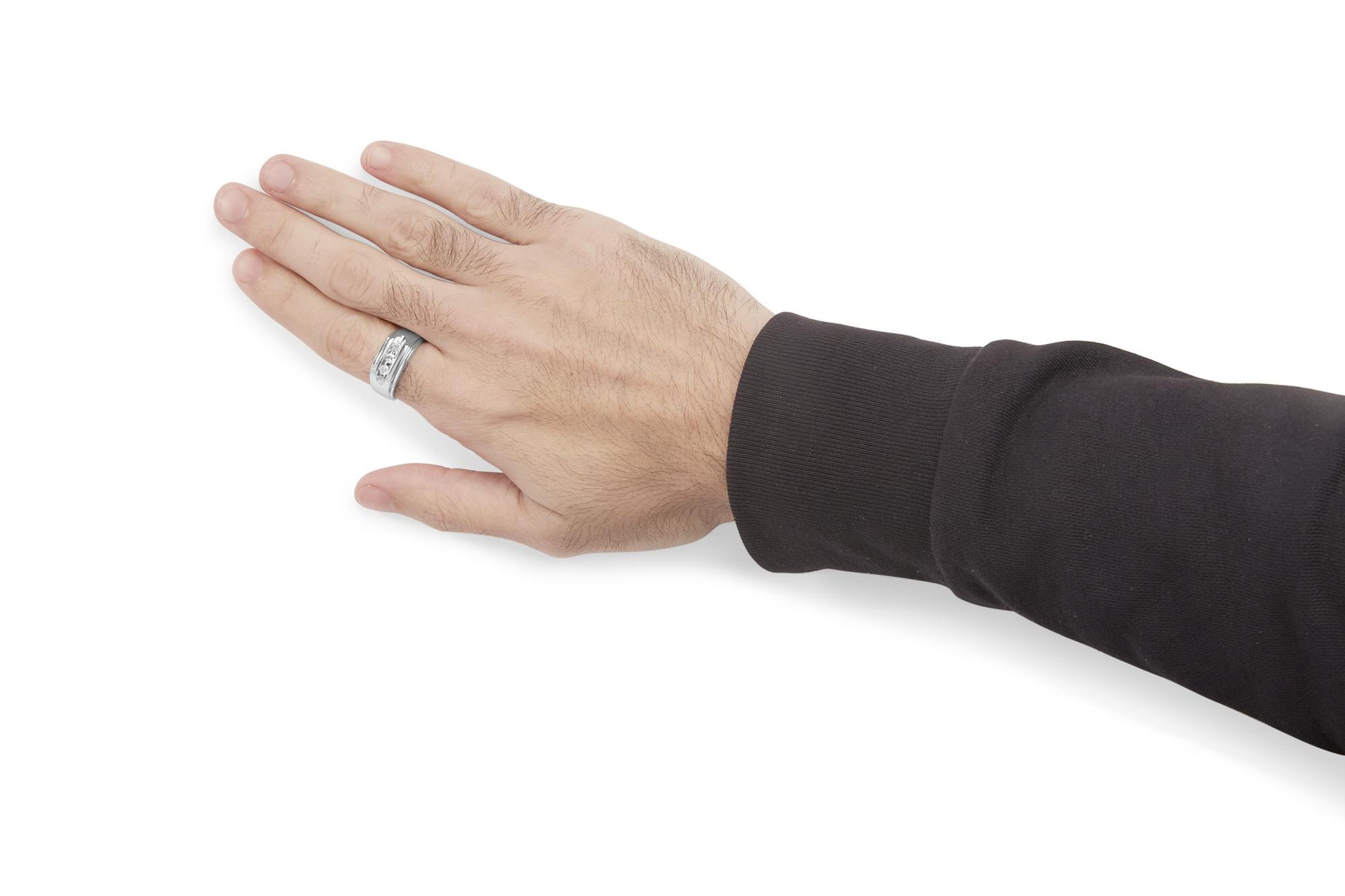 White-colored ring with three round white gemstones set in a channel, shown on a hand at a side angle.