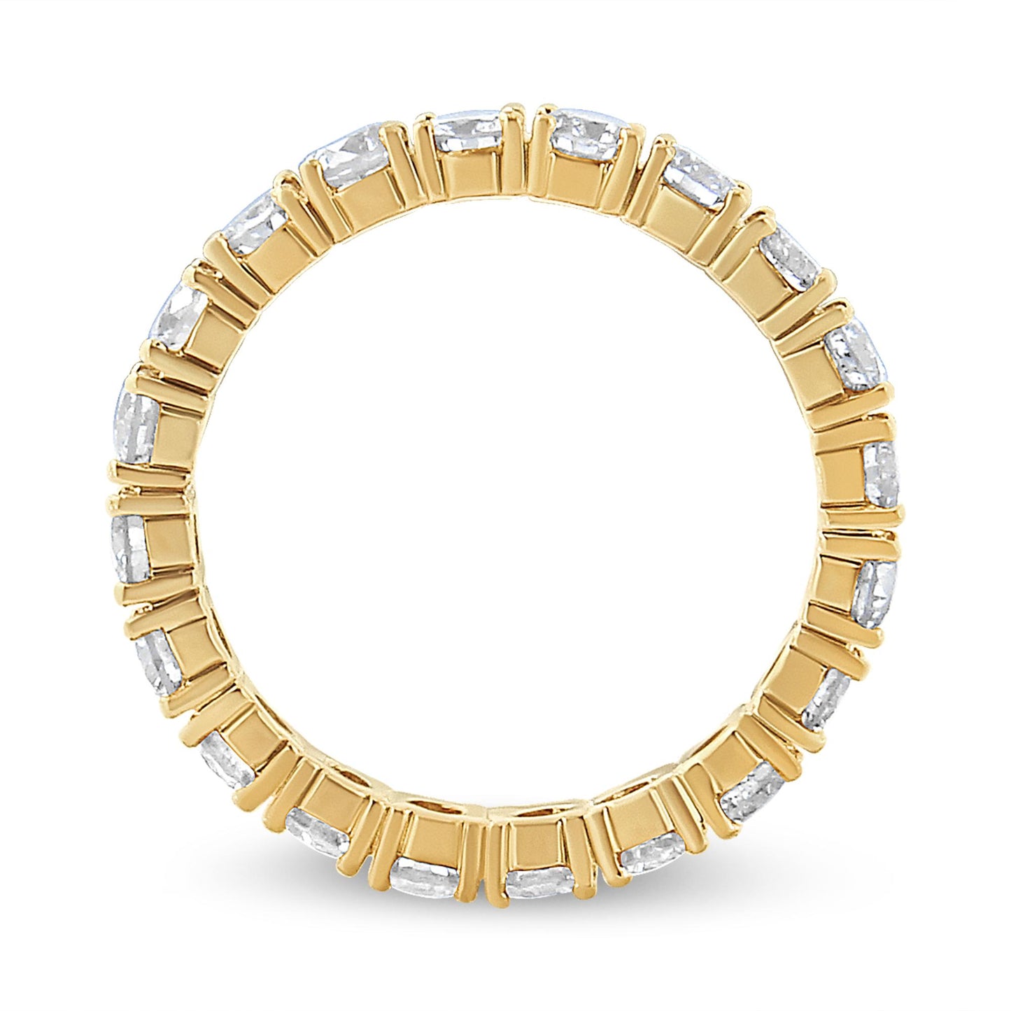 Top-down view of a yellow metal ring with multiple round white gemstones in prong settings encircling the band.