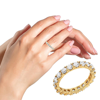 Yellow metal ring with round white gemstones in prong settings shown on a model's hand from a side angle, with a separate close-up of the ring from a slight top angle.