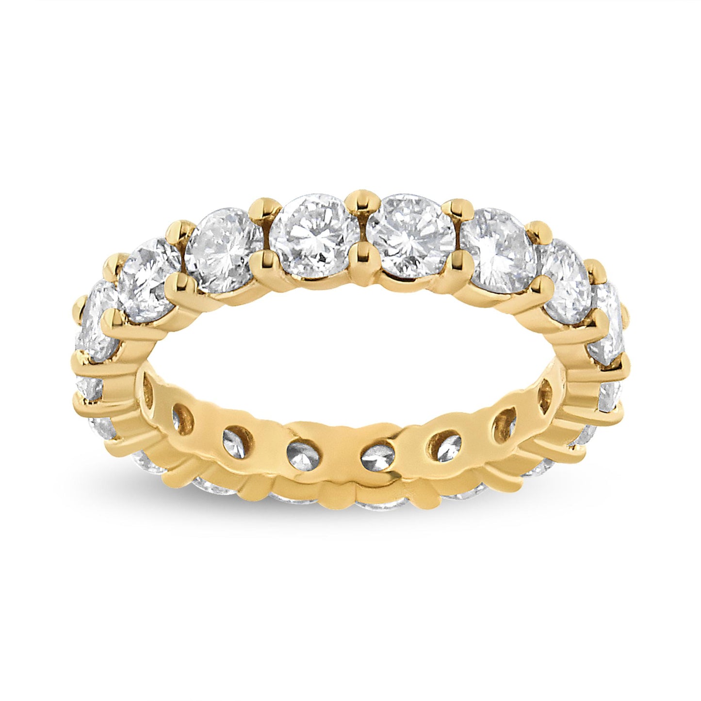 Close-up front angle of a yellow metal eternity ring set with round prong-set white gemstones all around.