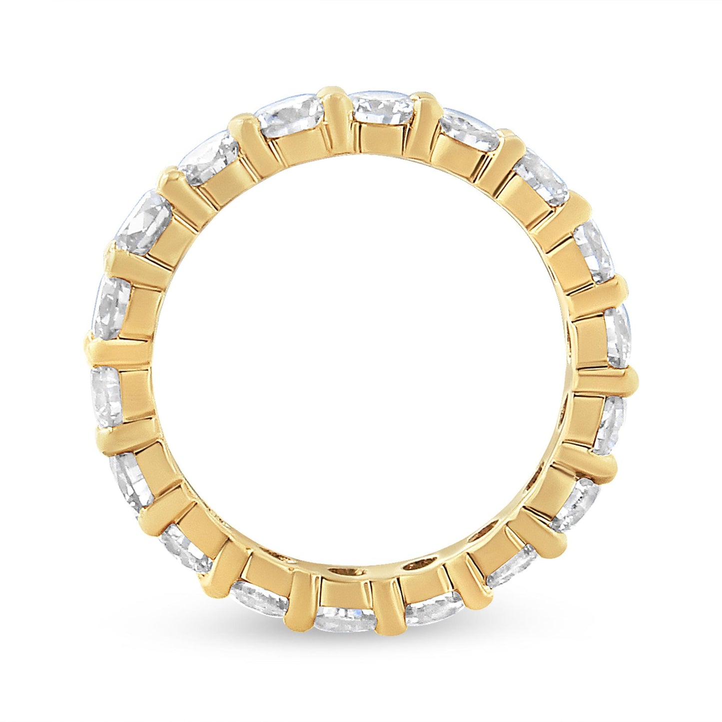 Top-down view of a yellow ring featuring round white gemstones in prong settings encircling the band.