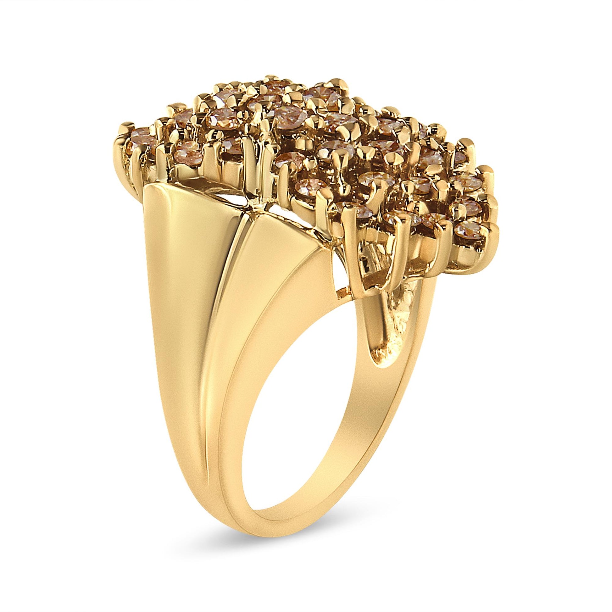 Yellow metal ring with a cluster of round champagne-colored gemstones in prong settings, shown at an angled side view.