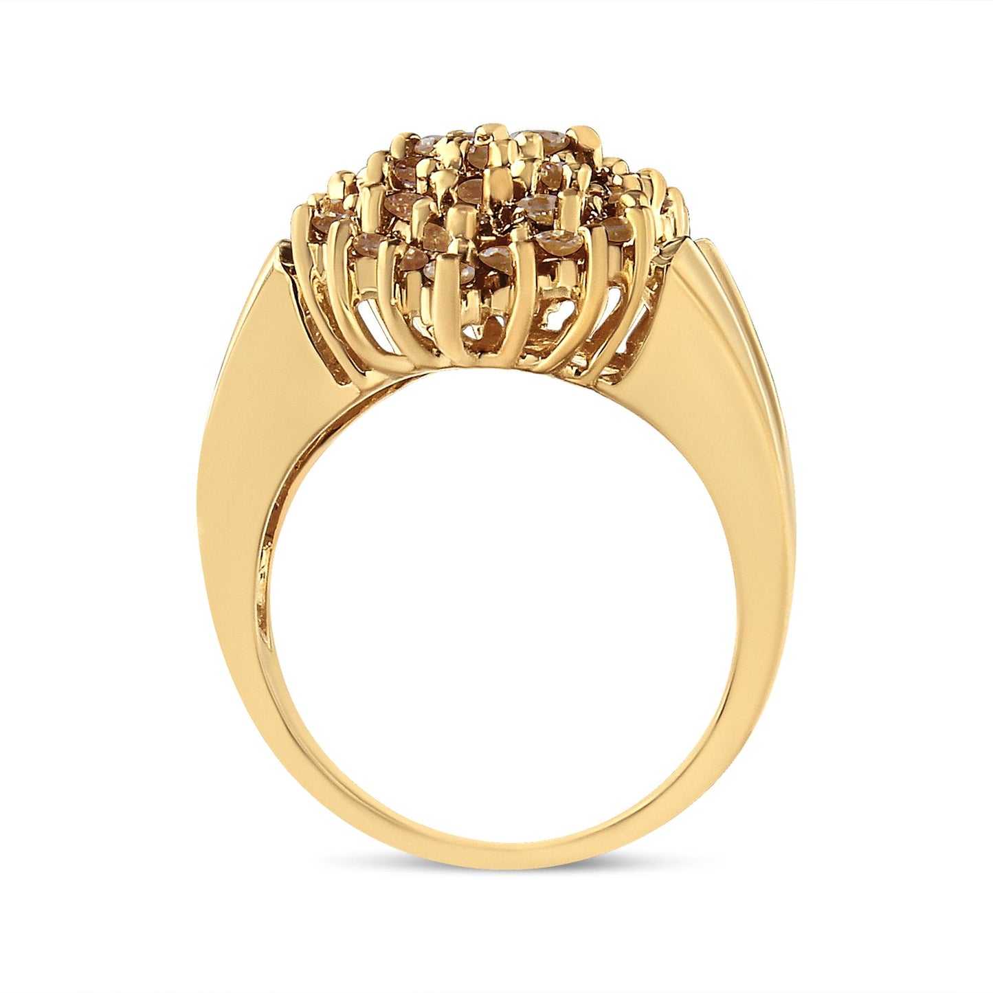 Yellow metal ring with round champagne-colored gemstones in prong settings, shown from a side angle.