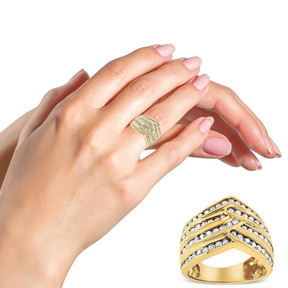 Yellow metal ring with multiple rows of channel-set round champagne-colored gemstones, shown on a model’s finger and in a close-up front angle.