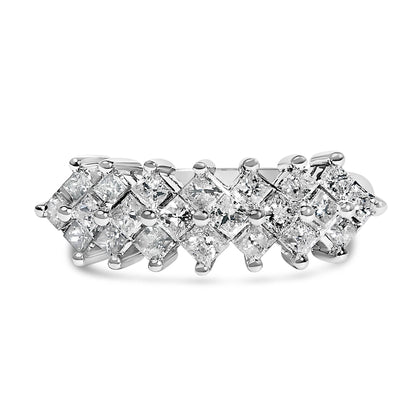Close-up angled top view of a white ring featuring princess-shaped white gemstones set invisibly in two rows.