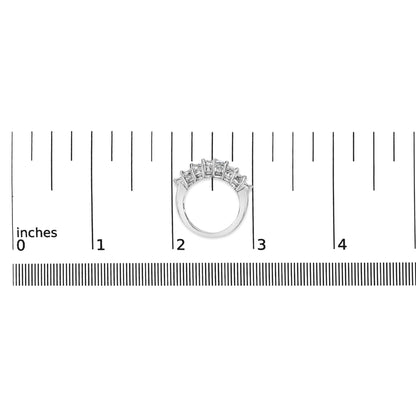 White metal ring shown on a scale, front angle, featuring two rows of white princess shape gemstones with invisible settings.