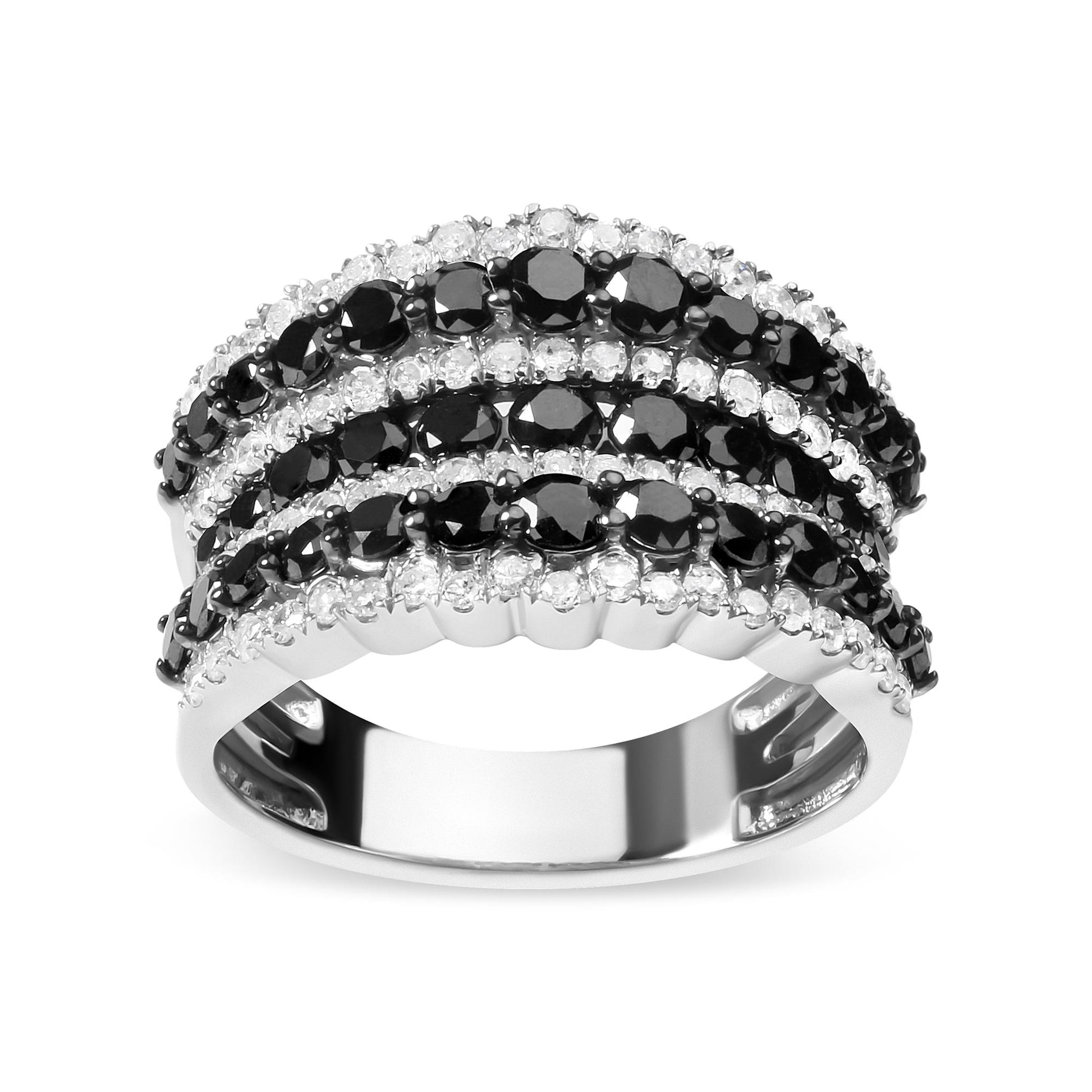 Close-up front angle of a white metal ring featuring multiple rows of prong-set black and white round gemstones.