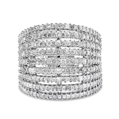 Front-facing view of a white ring featuring multiple rows of princess-shaped white gemstones in shared prong settings.