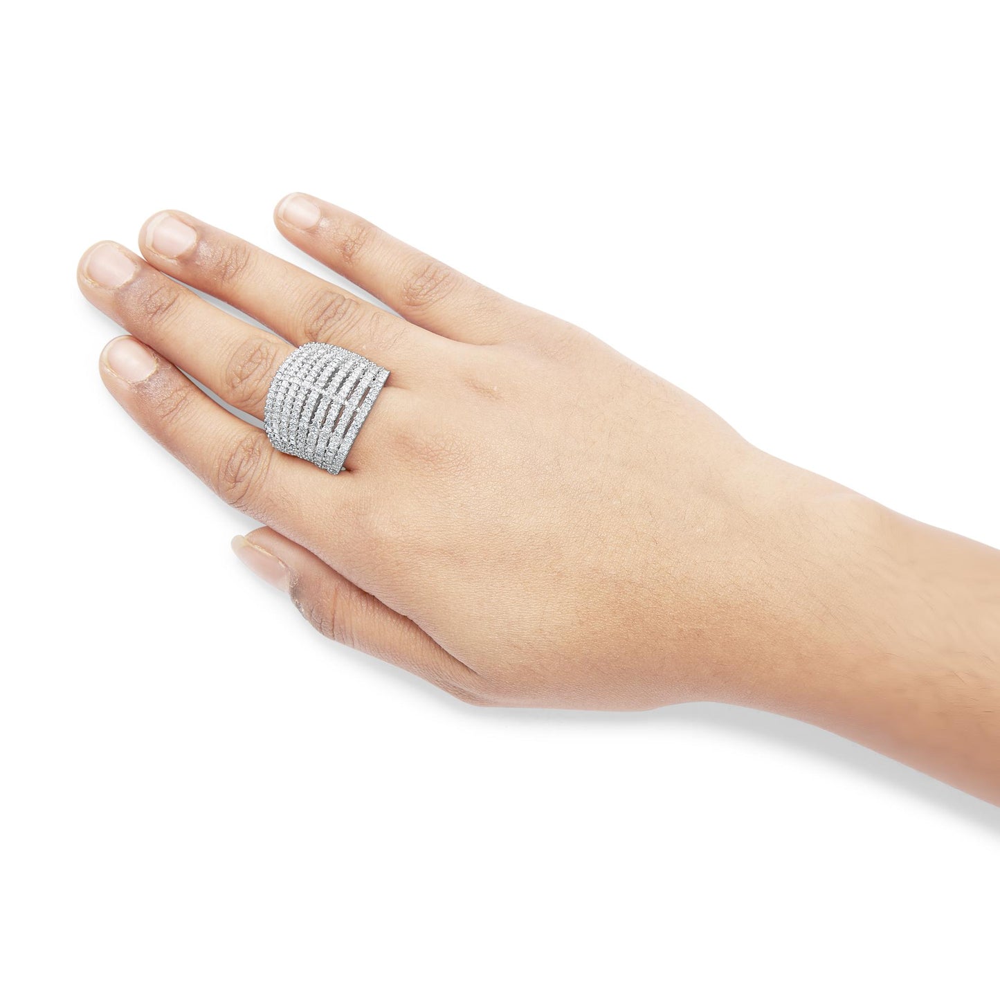 White metal ring with multiple rows of small princess-shaped white gemstones in shared prong setting, shown on a hand from a slightly angled top view.