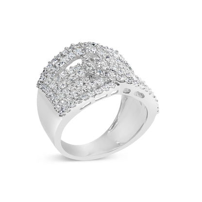 White metal ring with an intersecting design featuring rows of princess shape gemstones in invisible settings and round shape gemstones in prong settings, shown at a slight side angle.