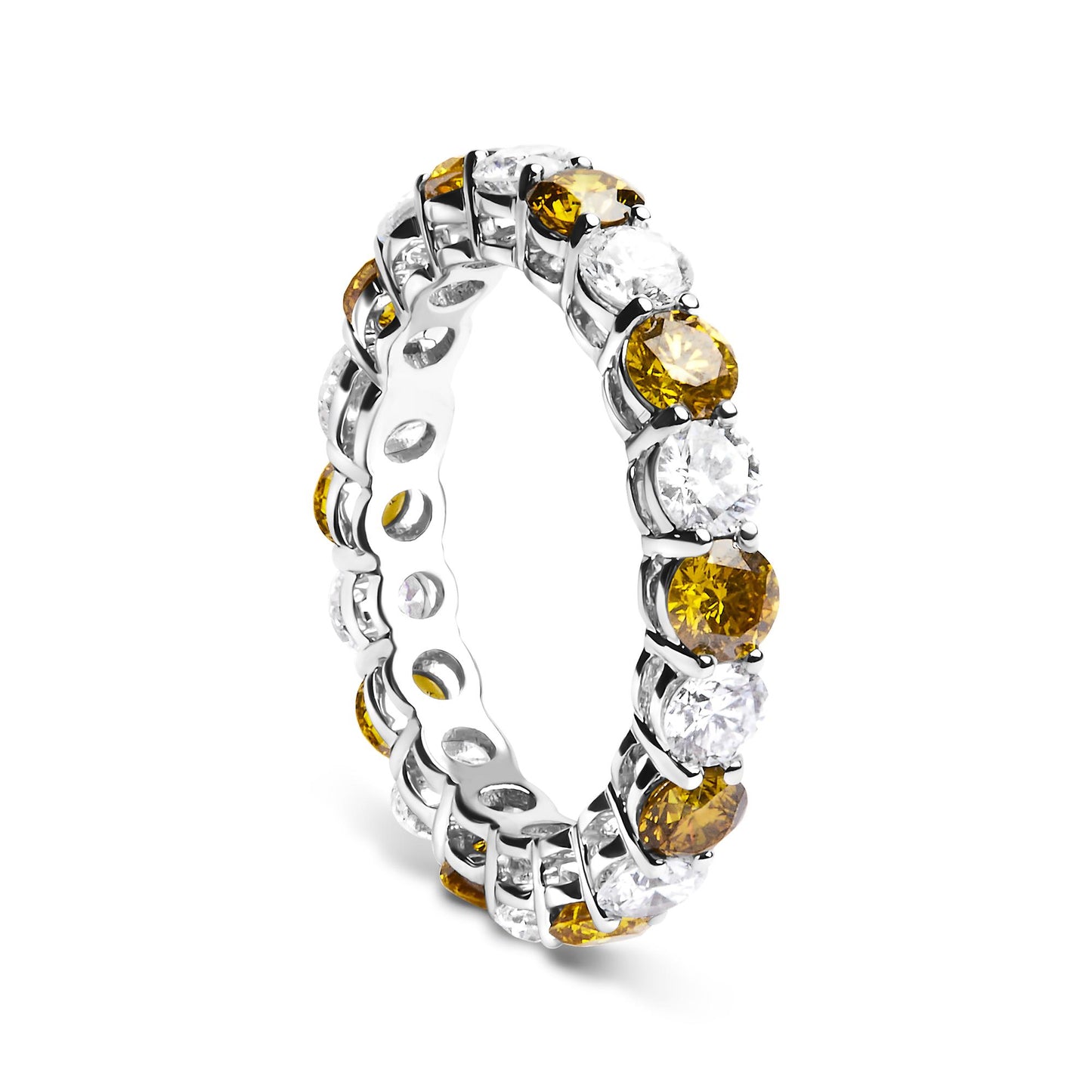 White metal eternity ring with alternating round yellow and white gemstones in prong settings, shown at an angled side view.
