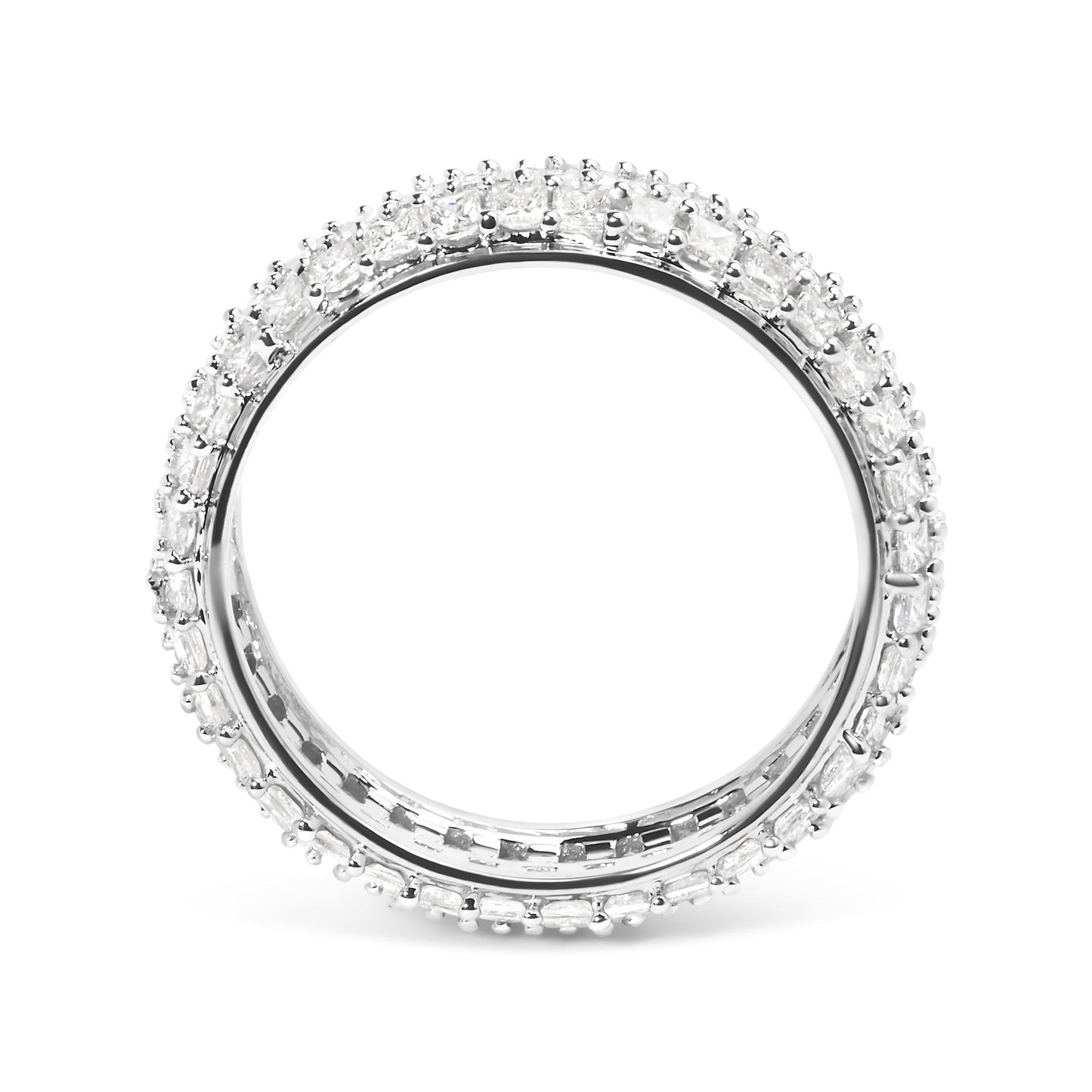 Top-down close-up view of a white ring with two rows of princess-shaped white gemstones in prong settings encircling the band.