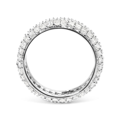 Top-down close-up view of a white ring with two rows of princess-shaped white gemstones in prong settings encircling the band.