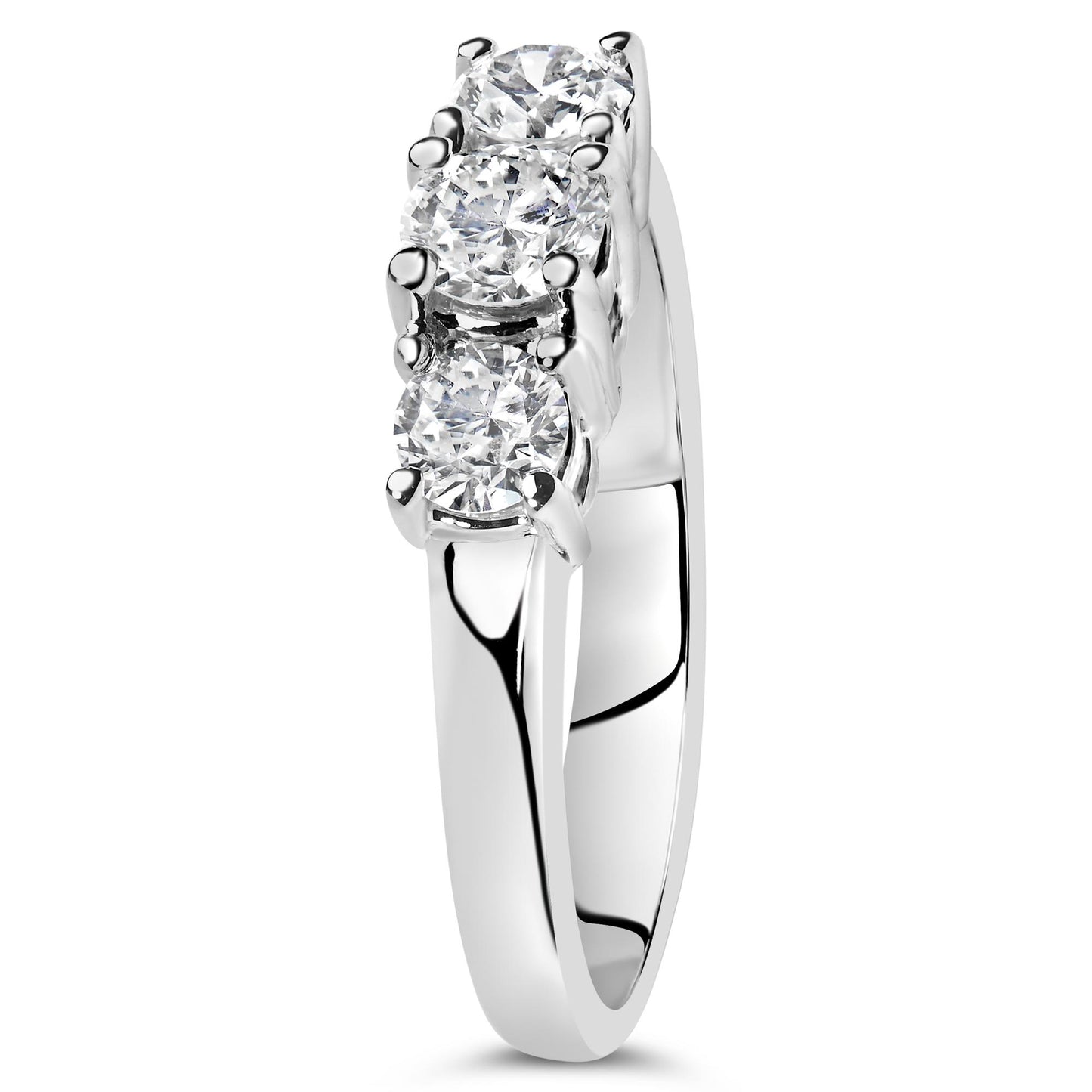 White metal ring with three round white gemstones in 4-prong settings, shown from a front side angle.