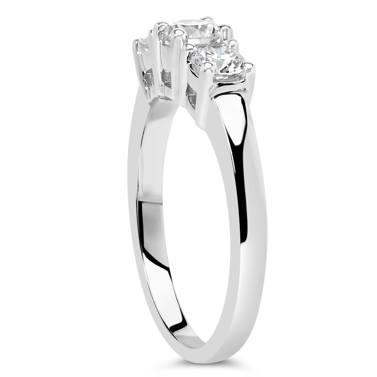 White metal ring with three round white gemstones in four-prong settings, shown at a side angle.