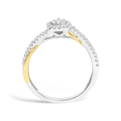 Side view of a two-tone ring with white and yellow metal colors, featuring a round white gemstone in prong setting at the center, surrounded by multiple smaller round white gemstones in prong settings along the band.