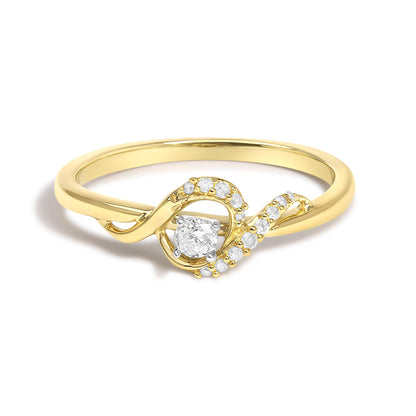 Yellow metal ring with a swirling design featuring one round white gemstone in prong setting at the center and multiple smaller round white gemstones embedded along the swirl, shown from a front angle on a white background.