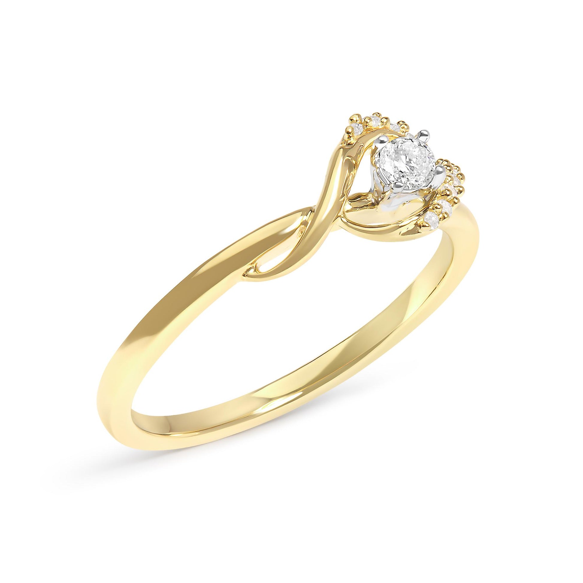 Yellow metal ring with an open interlocking band design, featuring a round white gemstone in a prong setting at the center, surrounded by small white gemstones, shown in a close-up angled view.