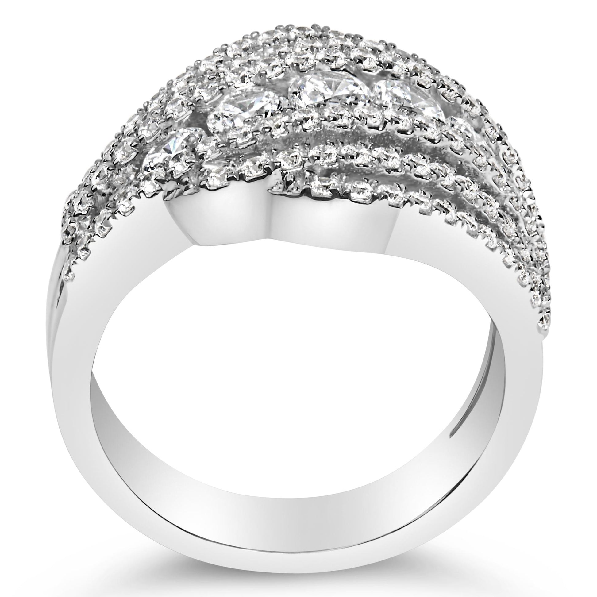 Close-up front angle of a white metal ring featuring multiple rows of prong-set round white gemstones across the top.
