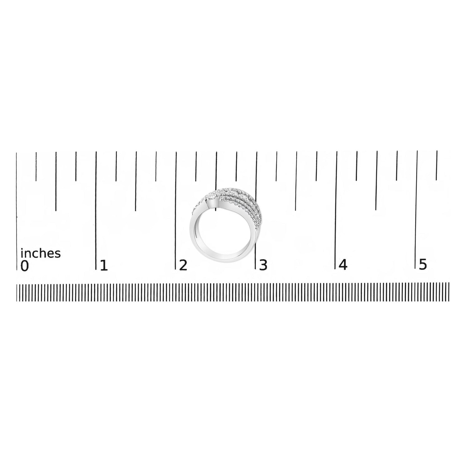 White metal ring with multiple rows of small round white gemstones in prong settings, shown on a ruler scale in a top-down view.