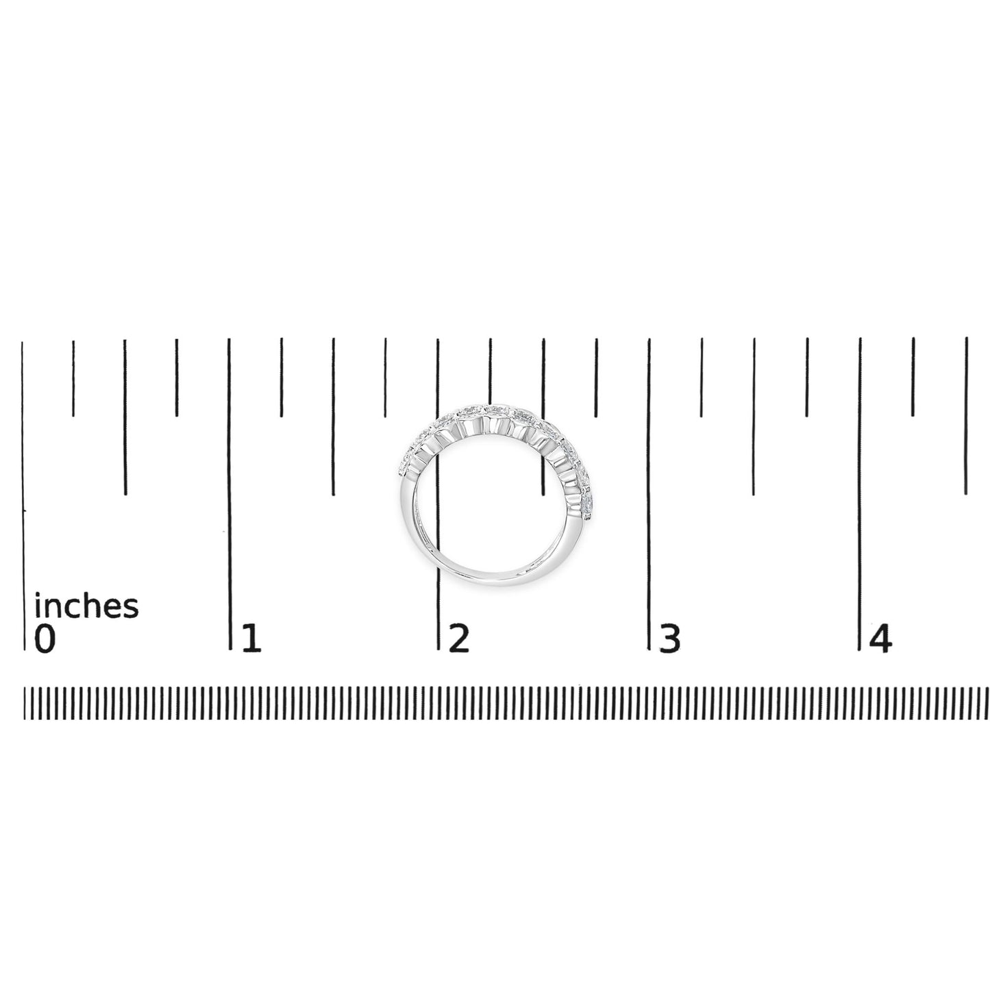 White metal ring with two rows of round white gemstones in prong settings, shown on a ruler for scale, top-down angle.