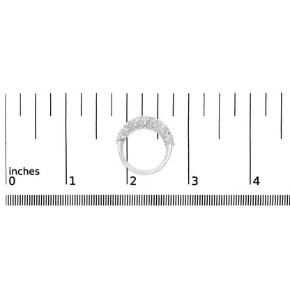 White metal ring with two rows of round white gemstones in prong settings, shown from a top angle on a measurement scale.