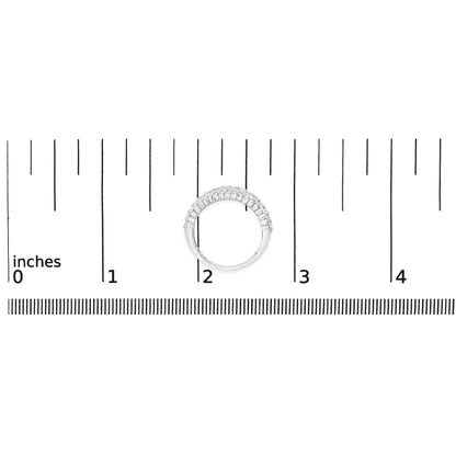 White metal ring with a curved top row featuring two sizes of round white gemstones in prong settings, shown on a ruler scale from a top view.