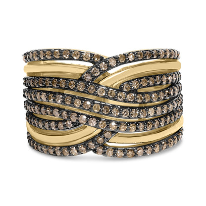 Front facing close-up of a yellow metal wide band ring with multiple intertwined strands set with round prong-set champagne-colored gemstones.