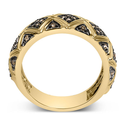 Yellow metal ring with round champagne-colored gemstones set in prong settings in a crisscross pattern, shown from a front angle.
