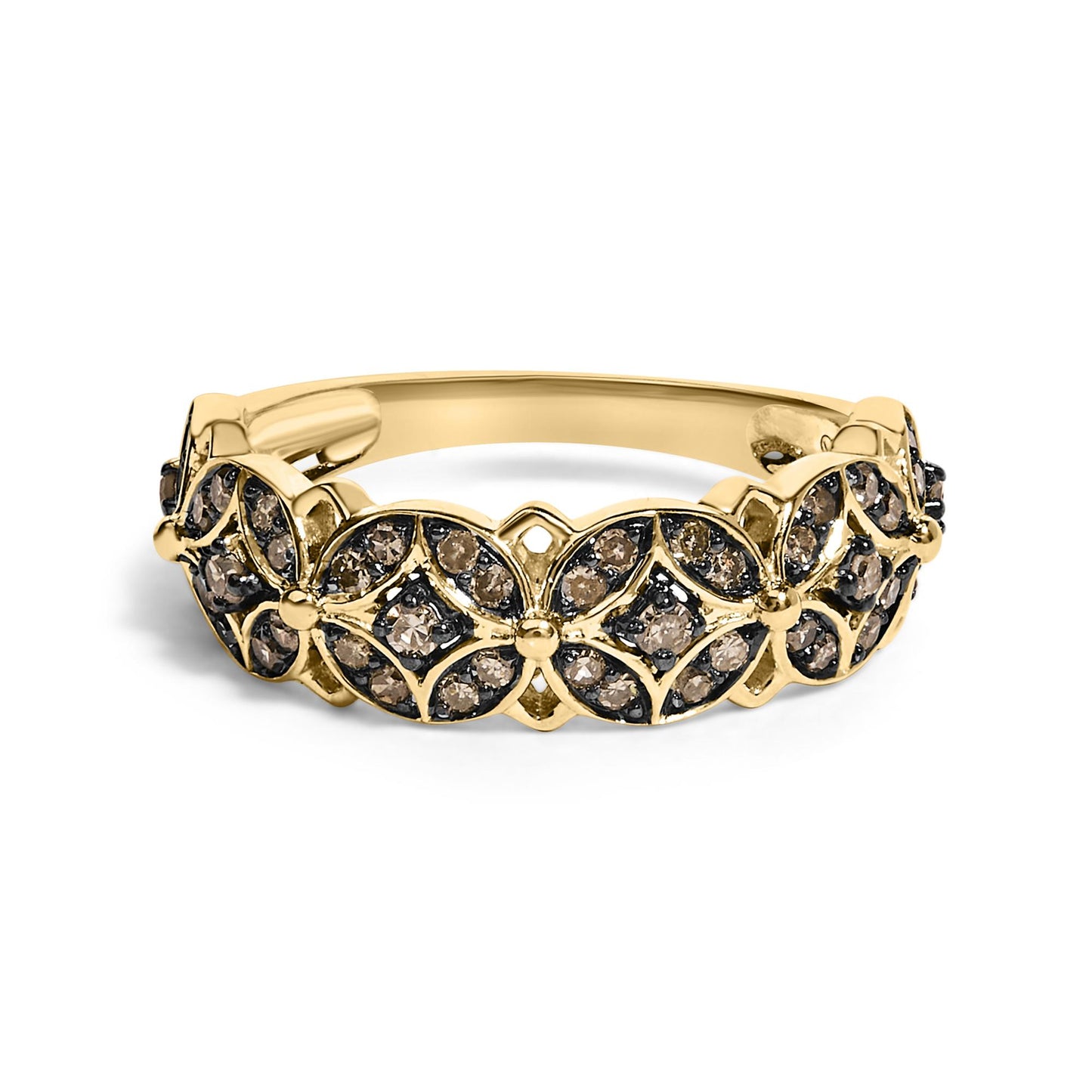Yellow metal ring with intertwined floral and geometric patterns, featuring round champagne-colored gemstones in prong settings, shown from the front angle on a white background.