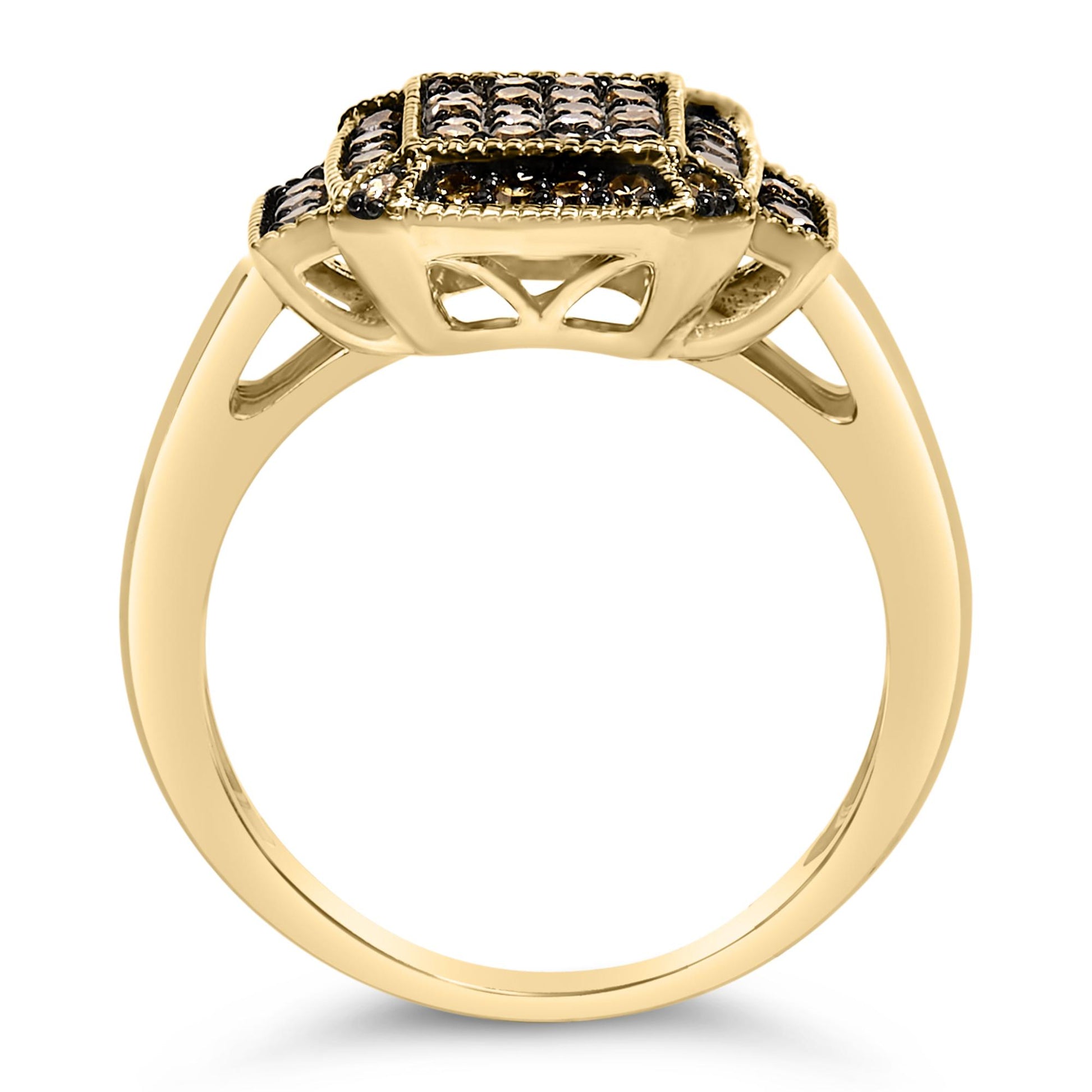 Yellow metal ring shown from a side angle with a raised square cluster top featuring multiple round champagne-colored gemstones in prong settings.