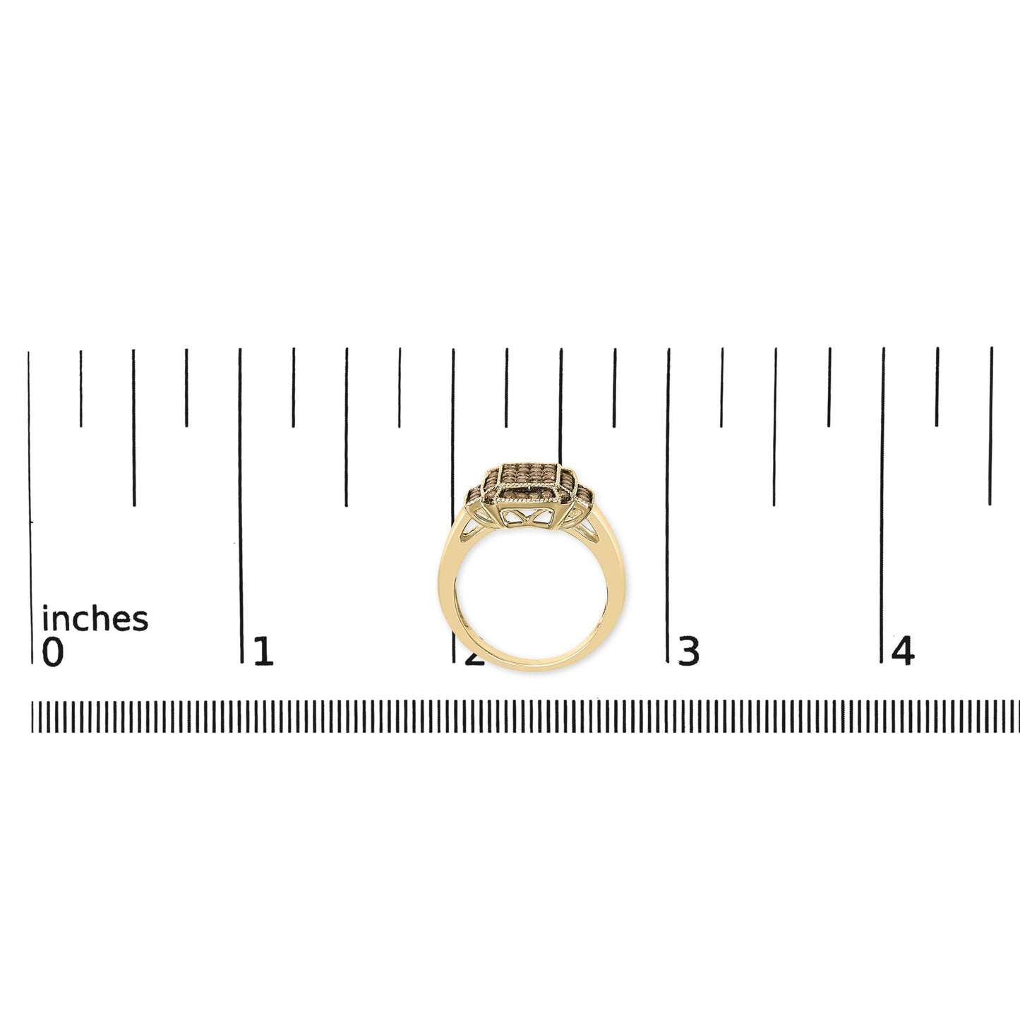 Yellow metal ring with rectangular cluster of prong-set round champagne-colored gemstones, shown from the side angle on a ruler scale.