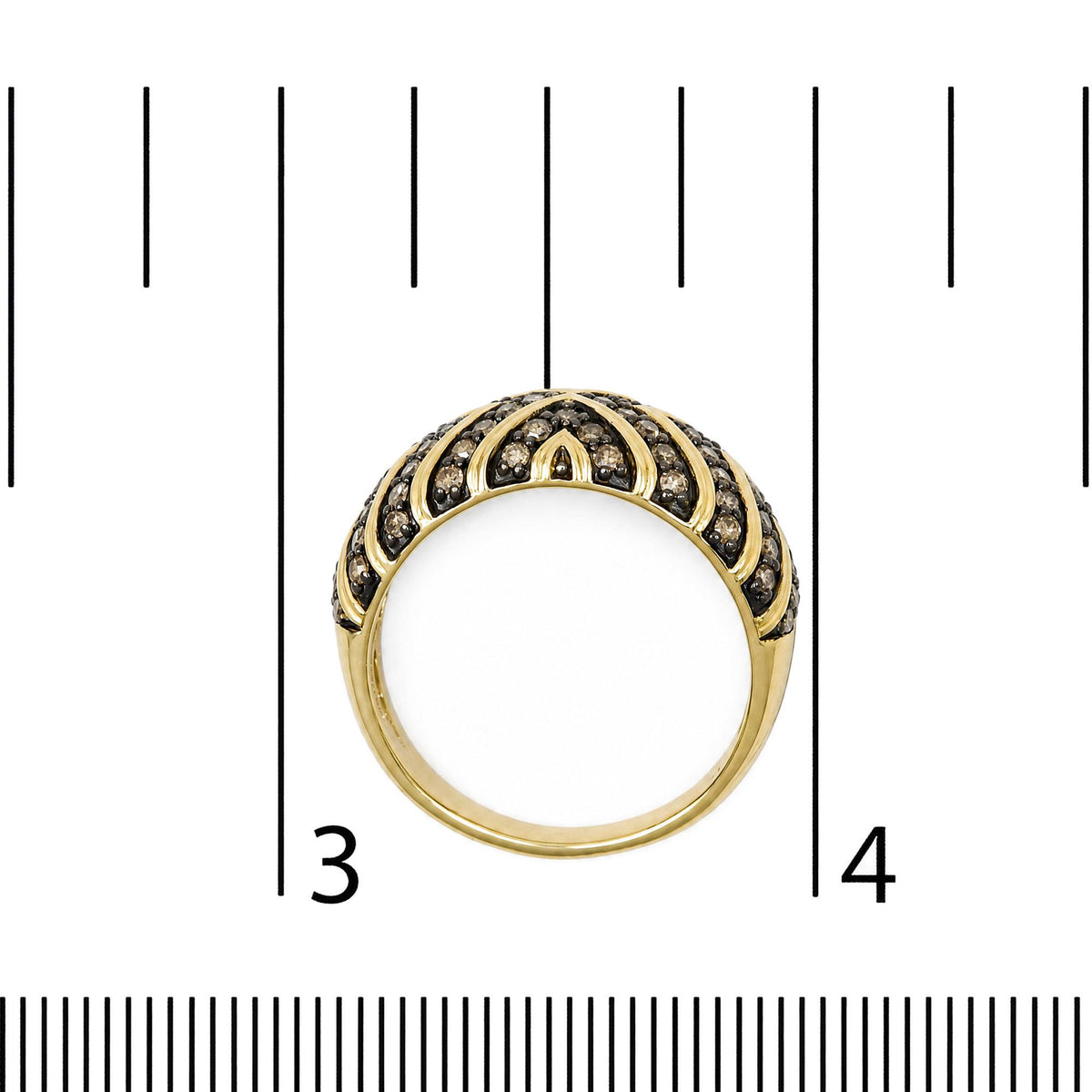 Yellow ring with round prong-set champagne-colored gemstones arranged in three rows forming a decorative pattern, shown from the front on a scale.