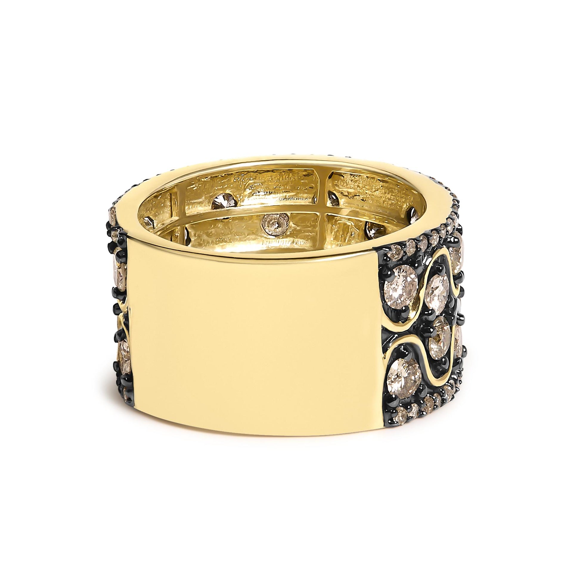 Close-up front angle of a wide yellow metal ring adorned with round champagne-colored gemstones set in prongs, displayed on a white background.