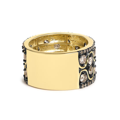 Close-up front angle of a wide yellow metal ring adorned with round champagne-colored gemstones set in prongs, displayed on a white background.