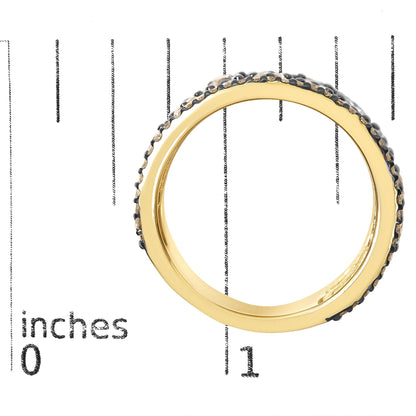 Close-up front angle of a yellow ring shown on a scale, featuring two rows of round prong-set champagne-colored gemstones around the band.