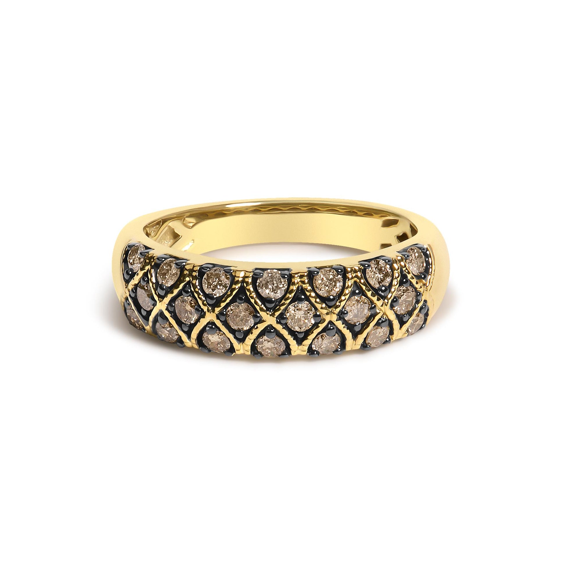 Close-up front angle of a yellow ring featuring round champagne-colored gemstones in prong settings arranged in a patterned design.