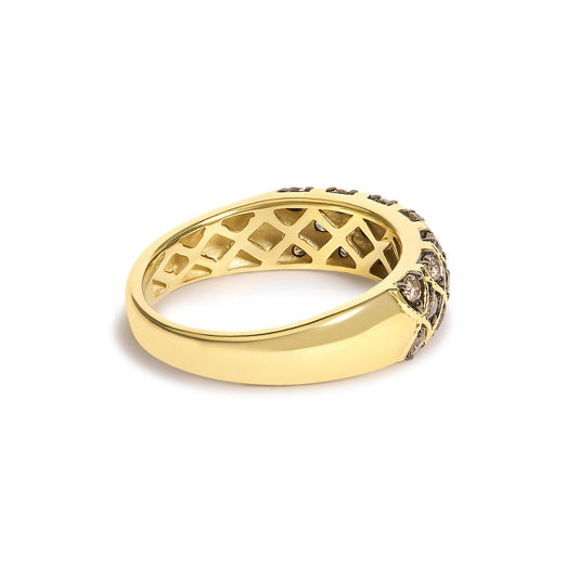 Yellow ring with round champagne-colored gemstones set in prongs, shown from a slightly angled side view.