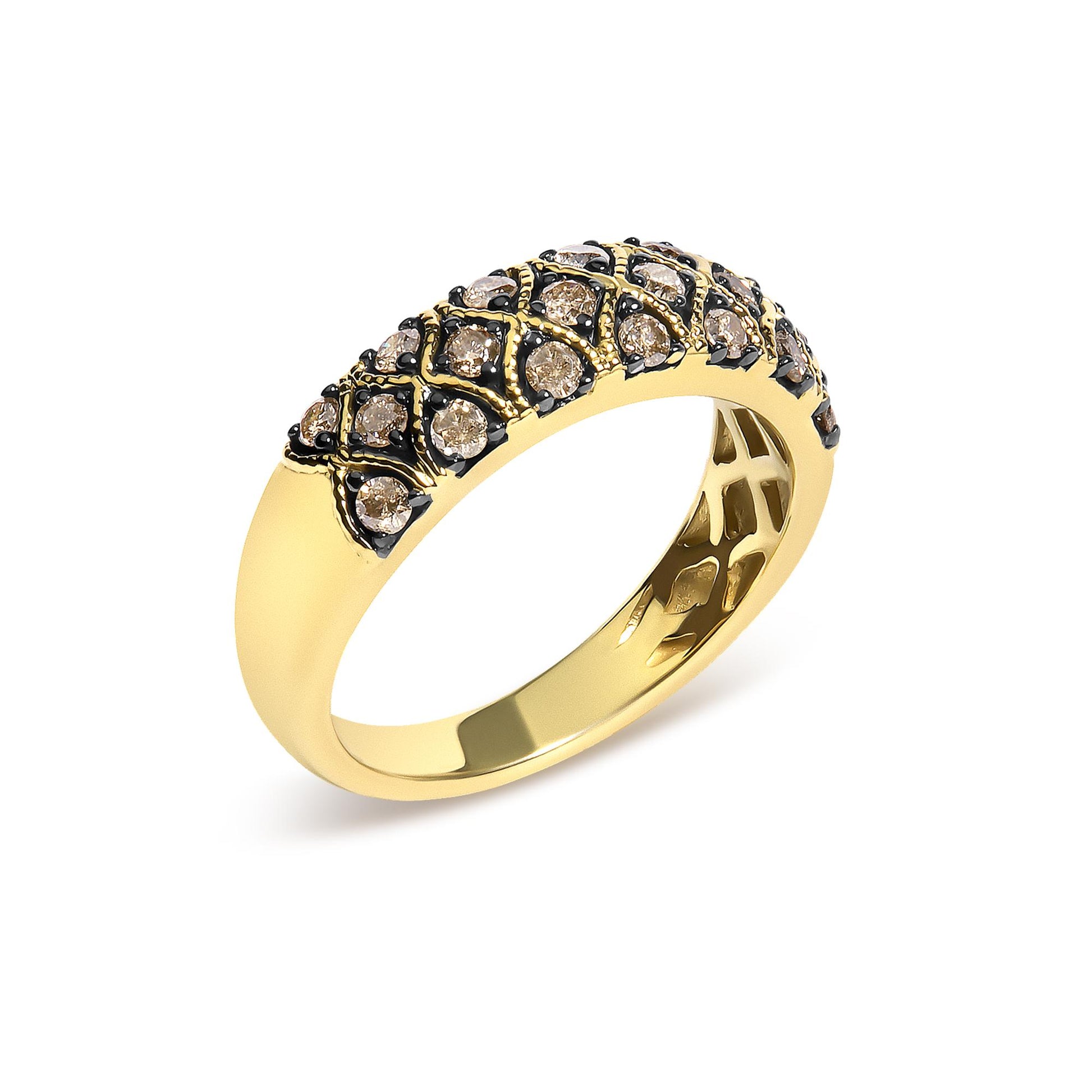 Close-up side angle of a yellow ring featuring multiple round champagne-colored gemstones in prong settings with black accents.