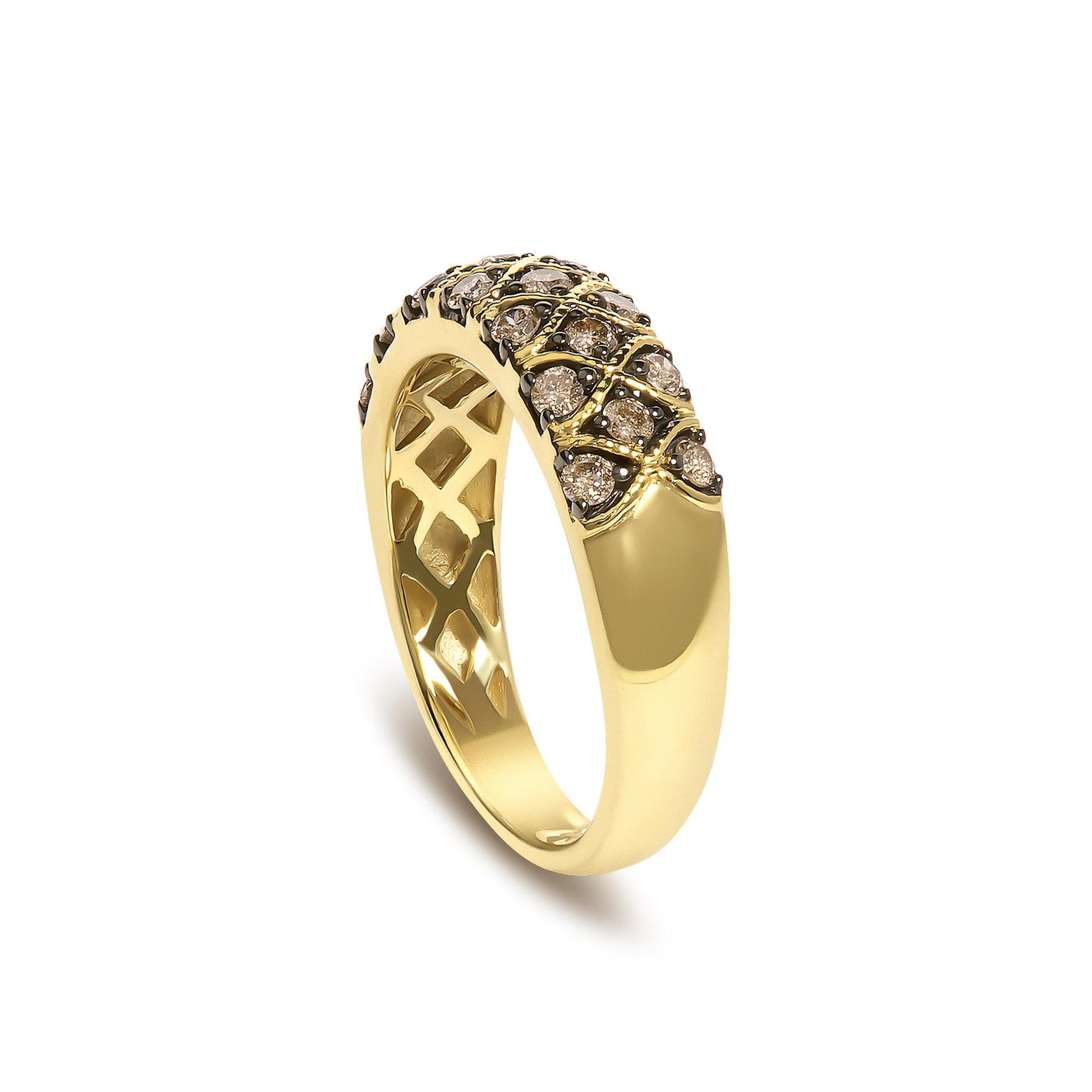 Close-up angled view of a yellow ring adorned with round champagne-colored gemstones in prong settings, featuring an intricate lattice design on the inner band.
