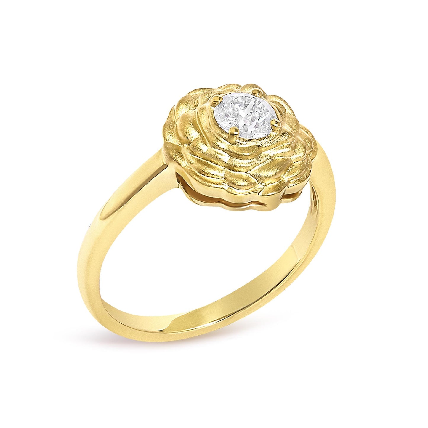Close-up front angle of a yellow metal ring featuring a round white gemstone set with four prongs, surrounded by a textured floral design.