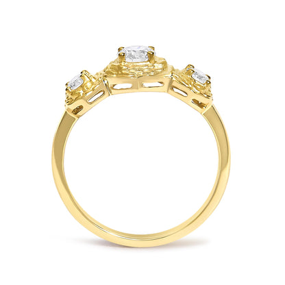 Close-up front angled view of a yellow ring featuring one round white gemstone in the center and two round white gemstones on each side in prong settings.