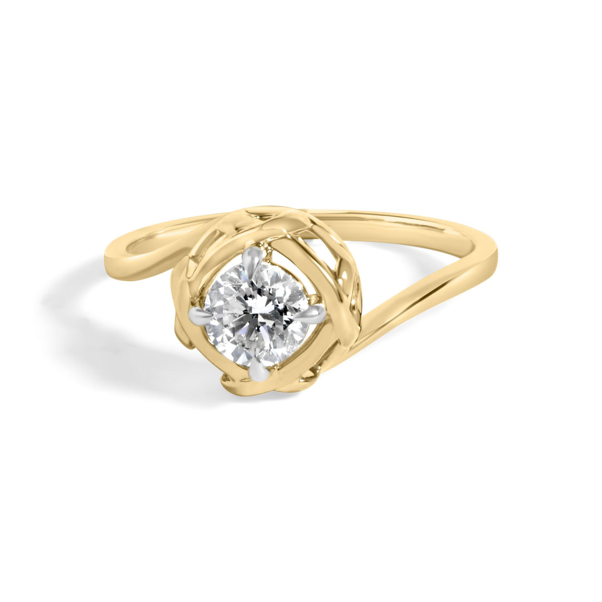 Close-up angled view of a yellow ring with a round white gemstone in a prong setting.