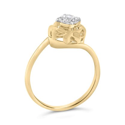 Yellow metal ring with a round white gemstone in prong setting, shown from a side angle.
