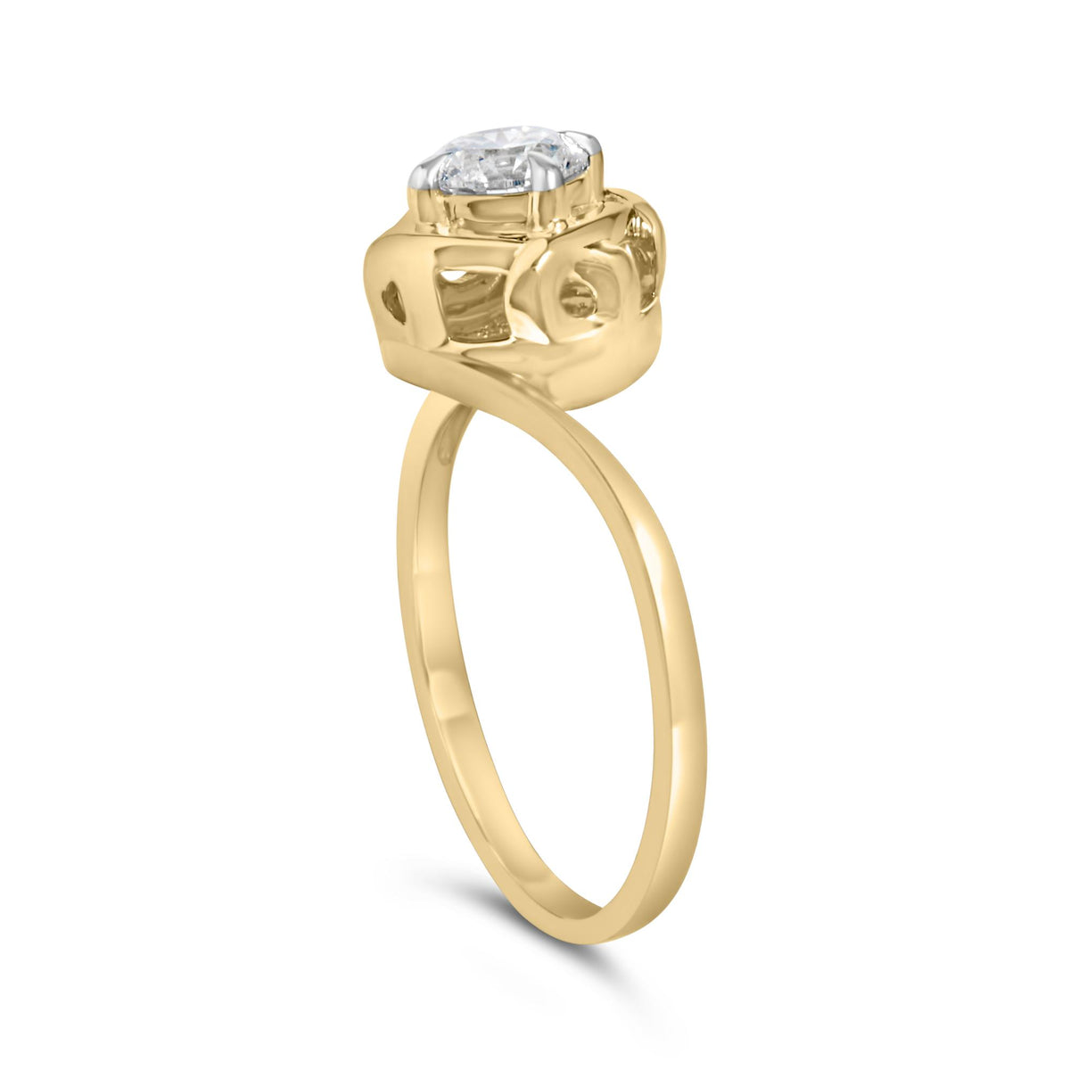 Yellow ring with a single round white gemstone in a prong setting, shown from a side angle.