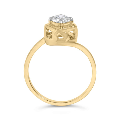 Yellow metal ring with a round white gemstone in prong setting, shown in a front close-up angled view.