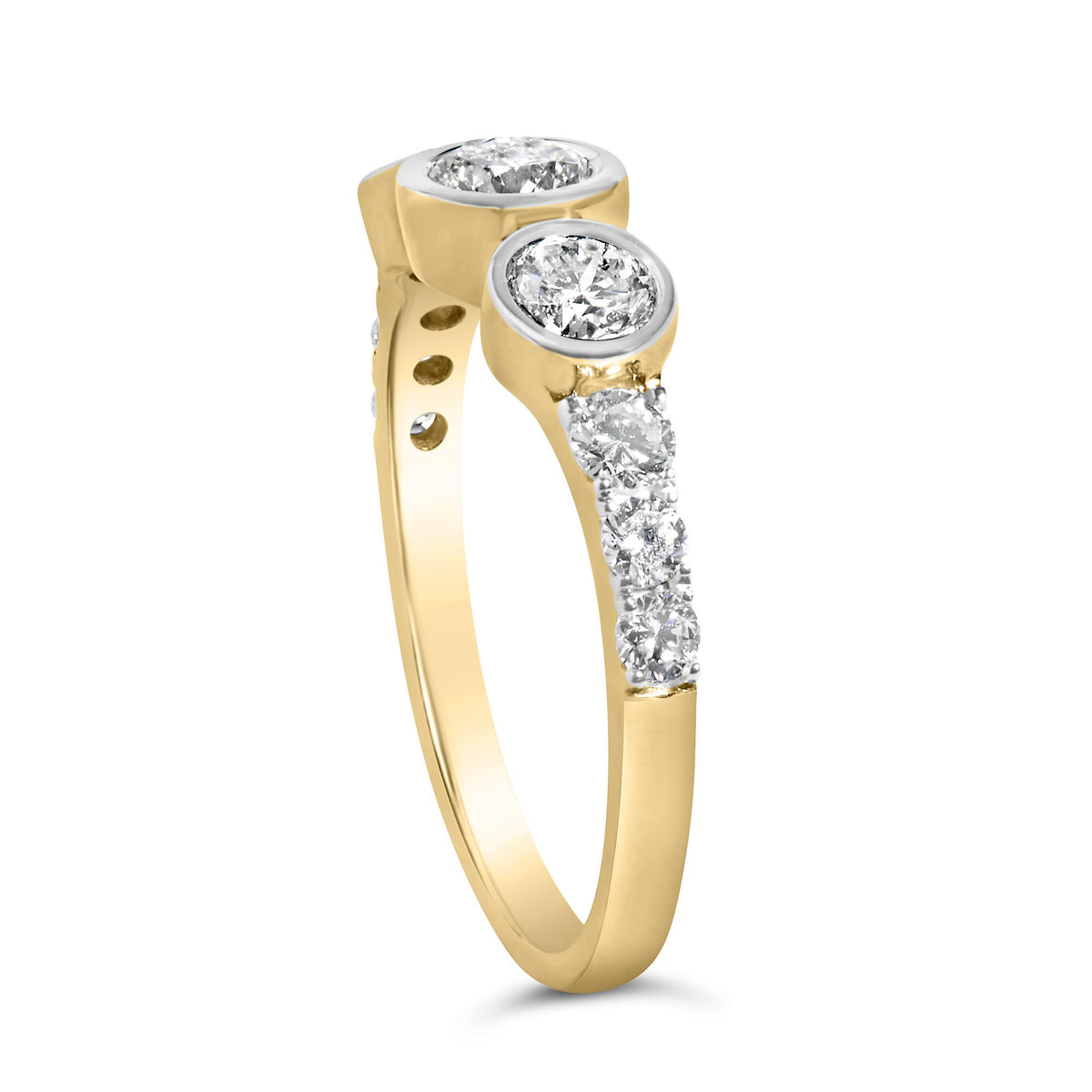 Close-up front angled view of a yellow ring featuring multiple round white gemstones in prong and bezel settings along the band.